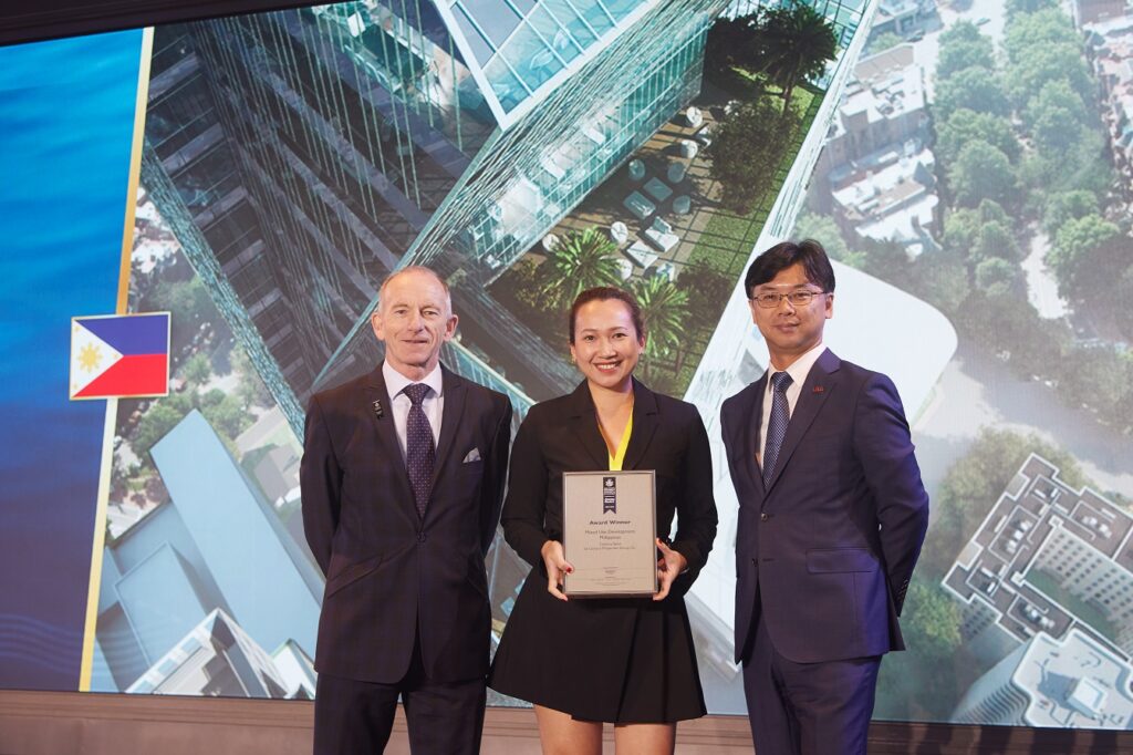 Jules Cruz CPG Corp Comm Marketing Group Head receives the Mixed Use Devt Award for Century Spire